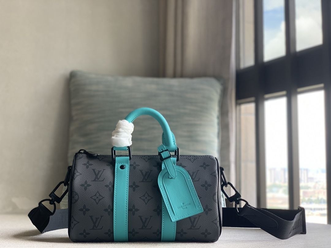 1V Keepall Bandoulière 25 — Silver-Light Blue